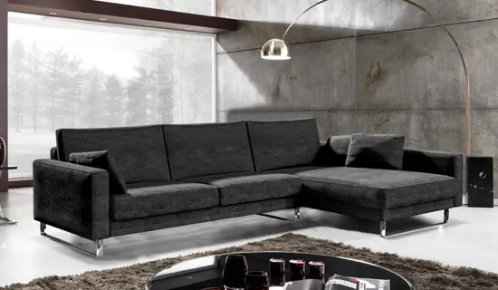 sofa de pata alta con tumbonra